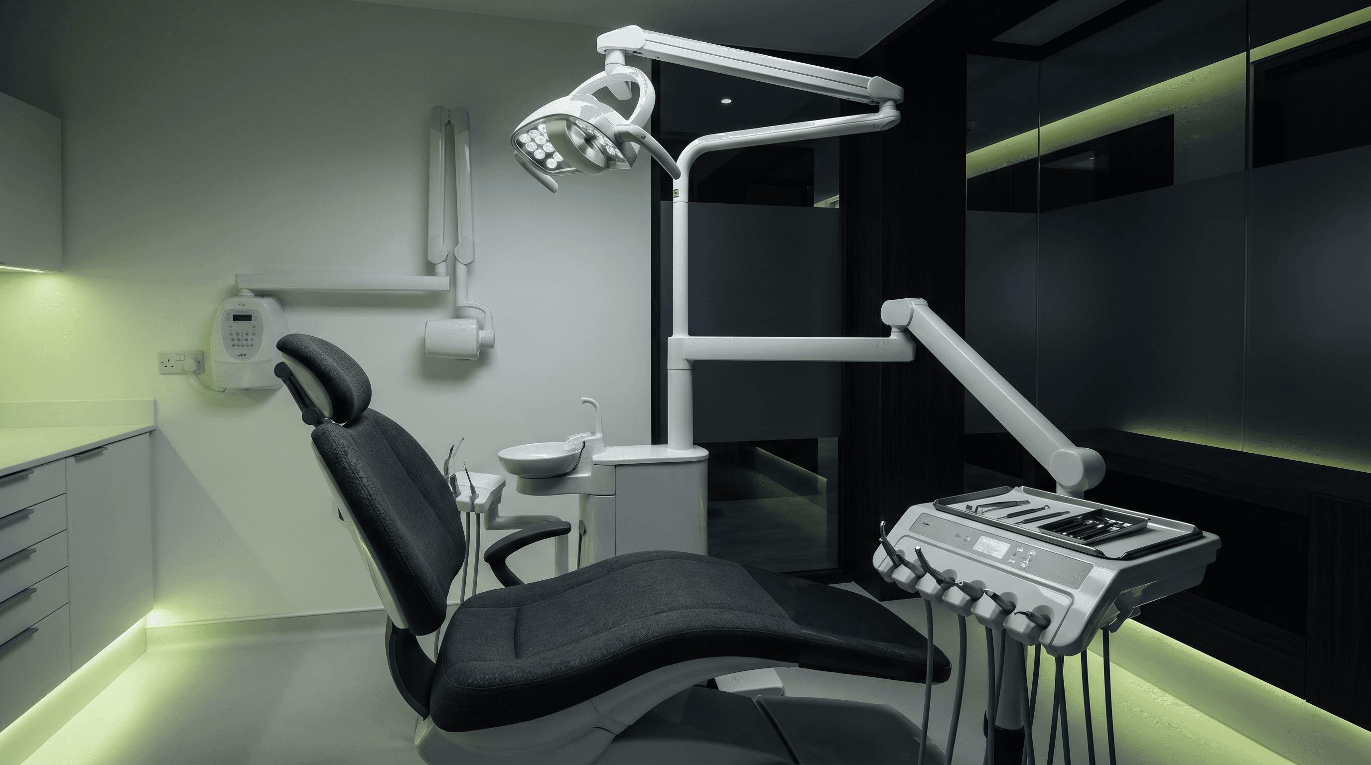 Clean modern UK dental practice interior with dental chair and professional clinical equipment